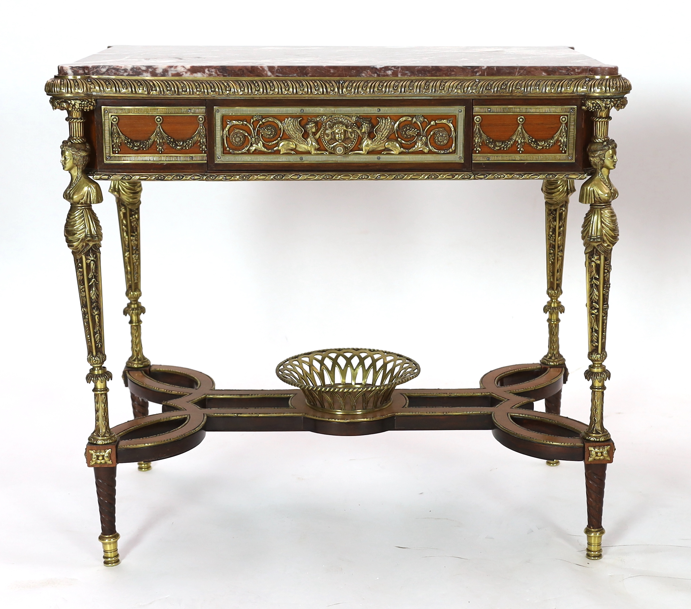 A pair of Louis XVI style ormolu mounted centre tables, 85cm wide, 51cm deep, 79cm high